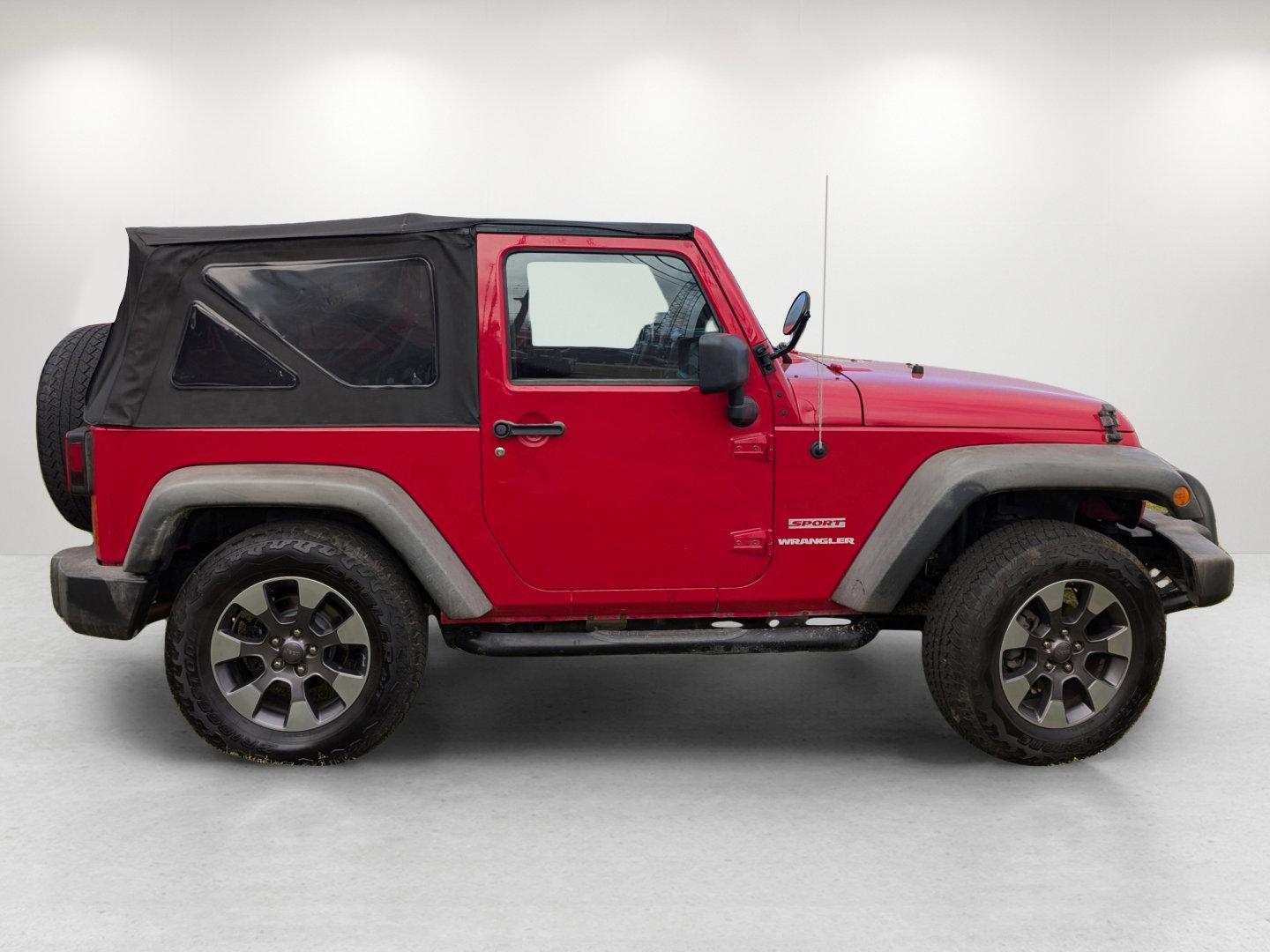 2012 /Black Interior Jeep Wrangler Sport (1C4AJWAG6CL) with an Gas V6 3.6L/231 engine, 6-Speed Manual transmission, located at 804 22nd Ave, Phenix City, AL, 36870, (334) 297-1860, 32.484749, -85.024475 - 2012 Jeep Wrangler Sport - Photo#3