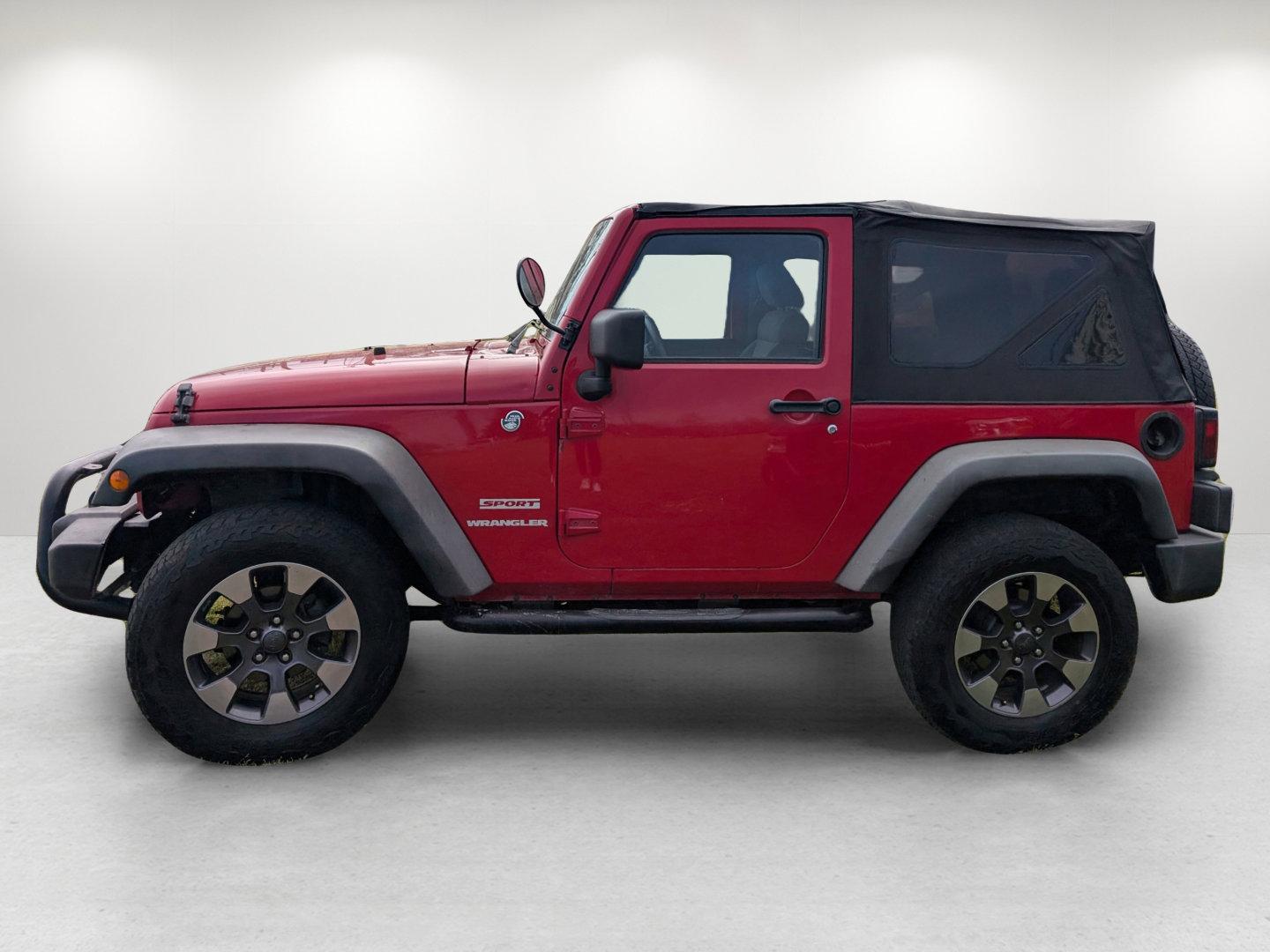 2012 /Black Interior Jeep Wrangler Sport (1C4AJWAG6CL) with an Gas V6 3.6L/231 engine, 6-Speed Manual transmission, located at 804 22nd Ave, Phenix City, AL, 36870, (334) 297-1860, 32.484749, -85.024475 - 2012 Jeep Wrangler Sport - Photo#7
