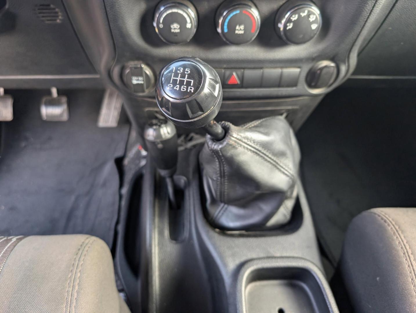 2012 /Black Interior Jeep Wrangler Sport (1C4AJWAG6CL) with an Gas V6 3.6L/231 engine, 6-Speed Manual transmission, located at 804 22nd Ave, Phenix City, AL, 36870, (334) 297-1860, 32.484749, -85.024475 - 2012 Jeep Wrangler Sport - Photo#12