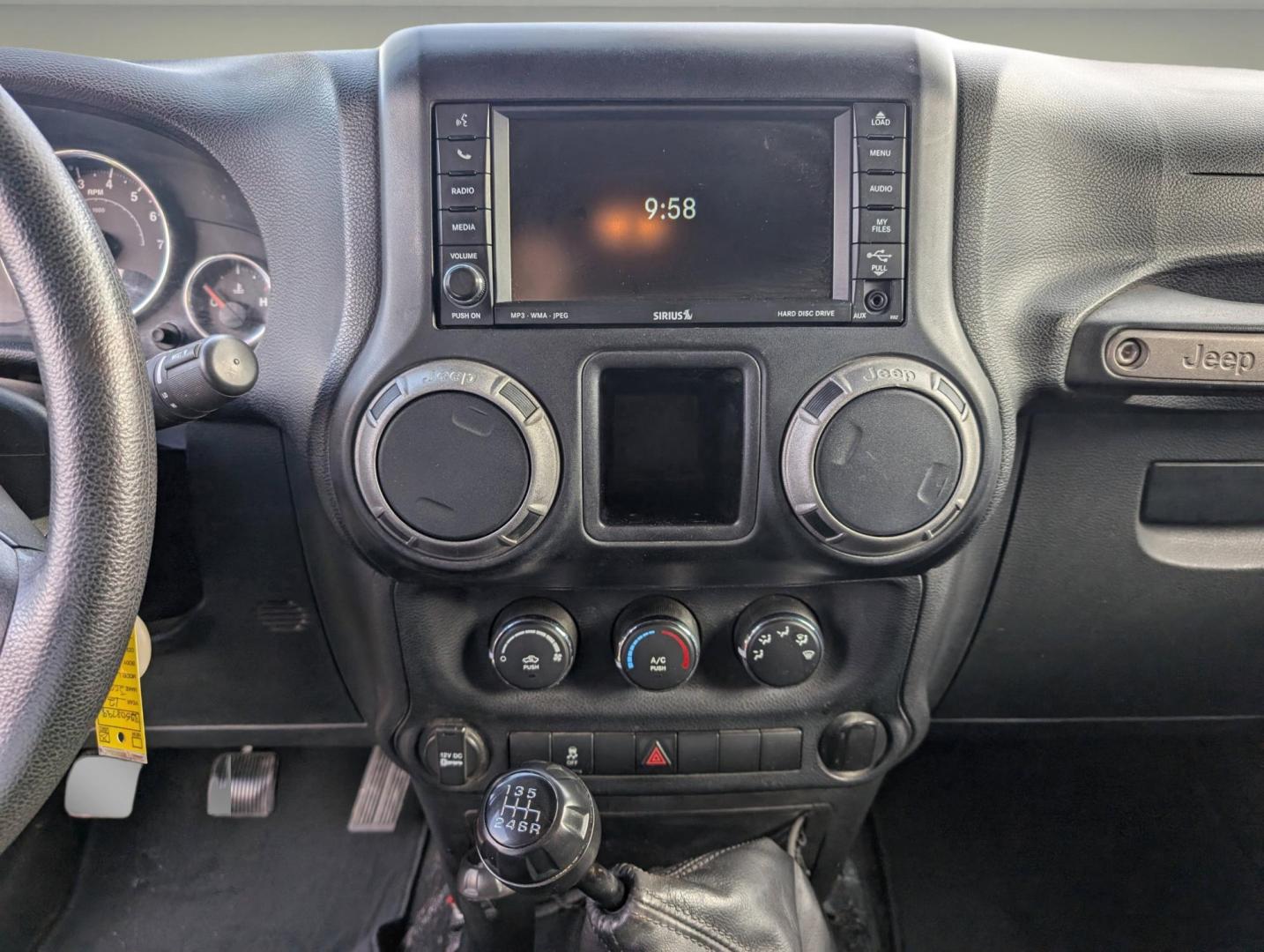2012 /Black Interior Jeep Wrangler Sport (1C4AJWAG6CL) with an Gas V6 3.6L/231 engine, 6-Speed Manual transmission, located at 804 22nd Ave, Phenix City, AL, 36870, (334) 297-1860, 32.484749, -85.024475 - 2012 Jeep Wrangler Sport - Photo#13