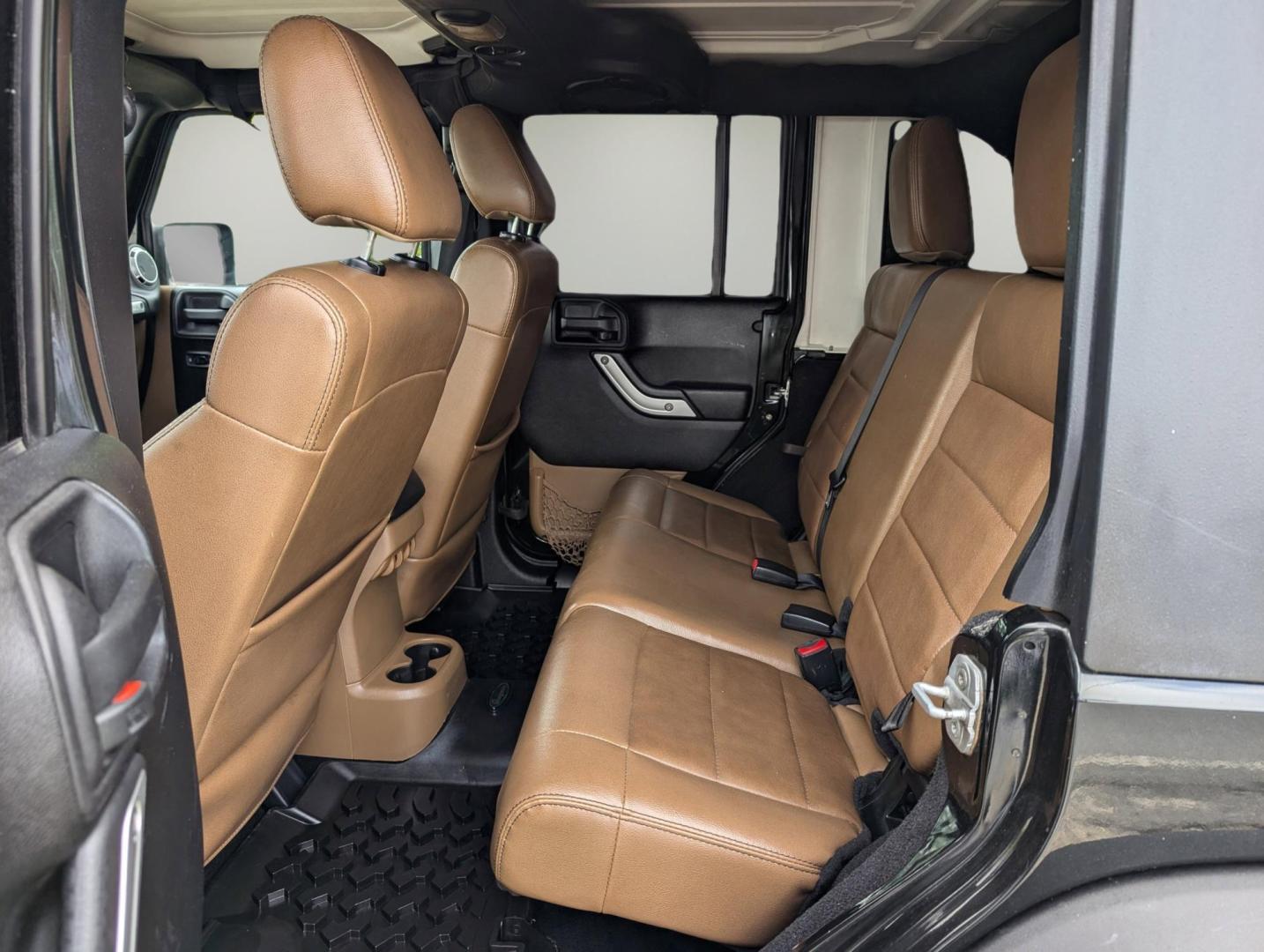 2012 /Black/Dark Saddle Interior Jeep Wrangler Unlimited Sahara (1C4BJWEG8CL) with an Gas V6 3.6L/220 engine, 5-Speed Automatic transmission, located at 3959 U.S. 80 W, Phenix City, AL, 36870, (334) 297-4885, 32.469296, -85.135185 - 2012 Jeep Wrangler Unlimited Sahara - Photo#13