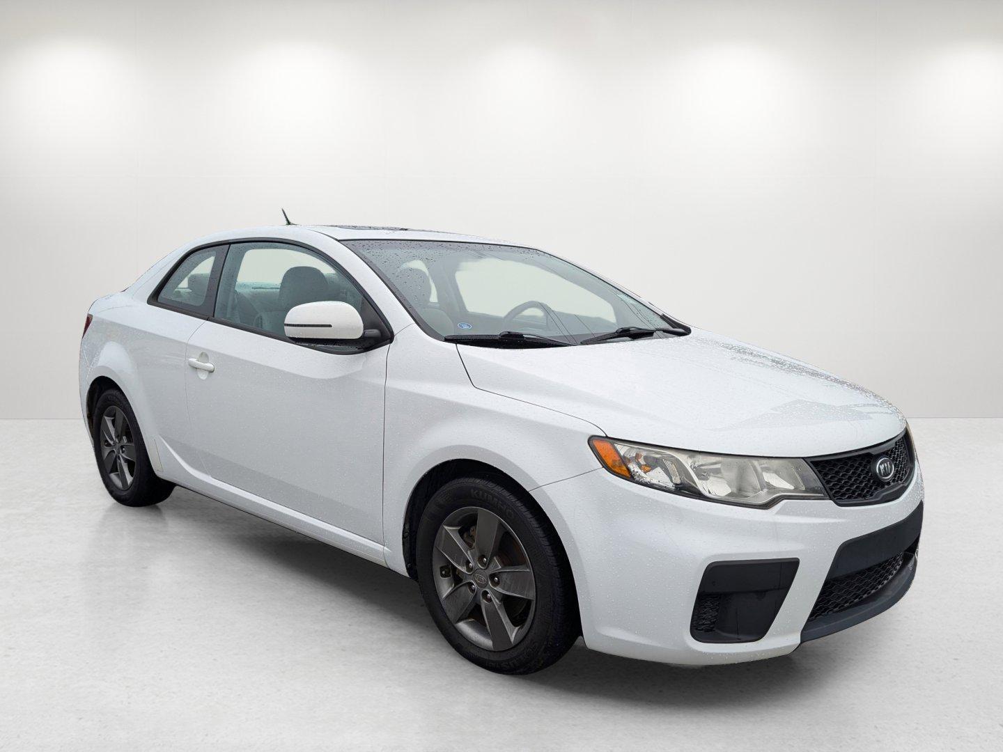 2012 /Stone Kia Forte Koup EX (KNAFU6A20C5) with an Gas I4 2.0L/122 engine, 6-Speed Automatic transmission, located at 1430 Gateway Drive, Opelika, AL, 36801, (334) 239-0944, 32.637871, -85.409790 - 2012 Kia Forte Koup EX - Photo#2