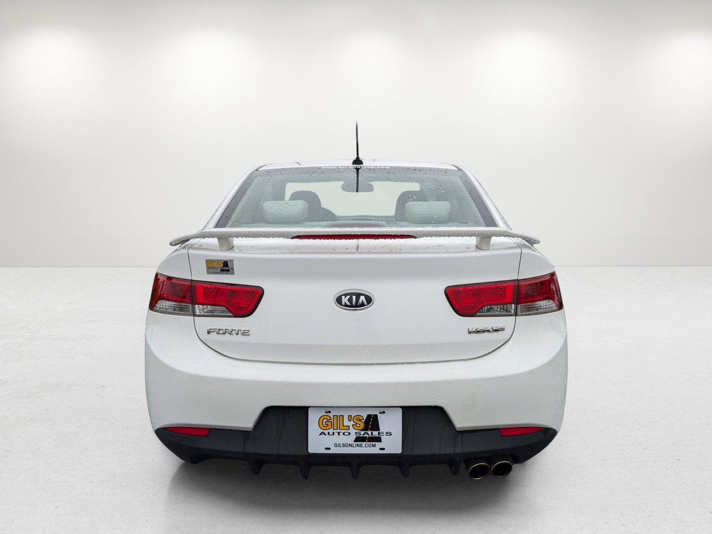 2012 /Stone Kia Forte Koup EX (KNAFU6A20C5) with an Gas I4 2.0L/122 engine, 6-Speed Automatic transmission, located at 1430 Gateway Drive, Opelika, AL, 36801, (334) 239-0944, 32.637871, -85.409790 - 2012 Kia Forte Koup EX - Photo#5
