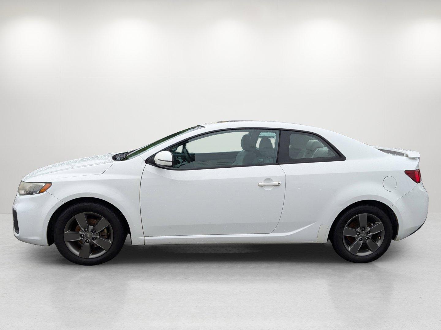 2012 /Stone Kia Forte Koup EX (KNAFU6A20C5) with an Gas I4 2.0L/122 engine, 6-Speed Automatic transmission, located at 1430 Gateway Drive, Opelika, AL, 36801, (334) 239-0944, 32.637871, -85.409790 - 2012 Kia Forte Koup EX - Photo#7