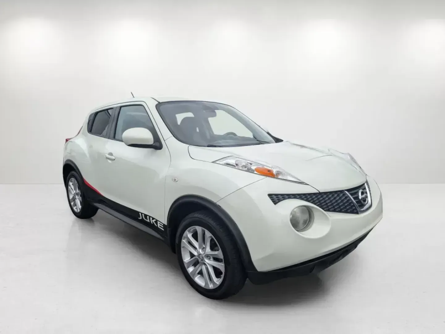2012 /Black Nissan Juke SV (JN8AF5MRXCT) with an Gas Turbocharged I4 1.6L/ engine, 1-Speed CVT transmission, located at 3959 U.S. 80 W, Phenix City, AL, 36870, (334) 297-4885, 32.469296, -85.135185 - **Discover Your Next Adventure with the 2012 Nissan Juke SV at Gils Auto!** <br /> <br /> If you're looking for a vehicle that perfectly balances style, efficiency, and versatility, the 2012 Nissan Juke SV is an excellent choice for those who love to explore urban landscapes and escape into nature. - Photo#3