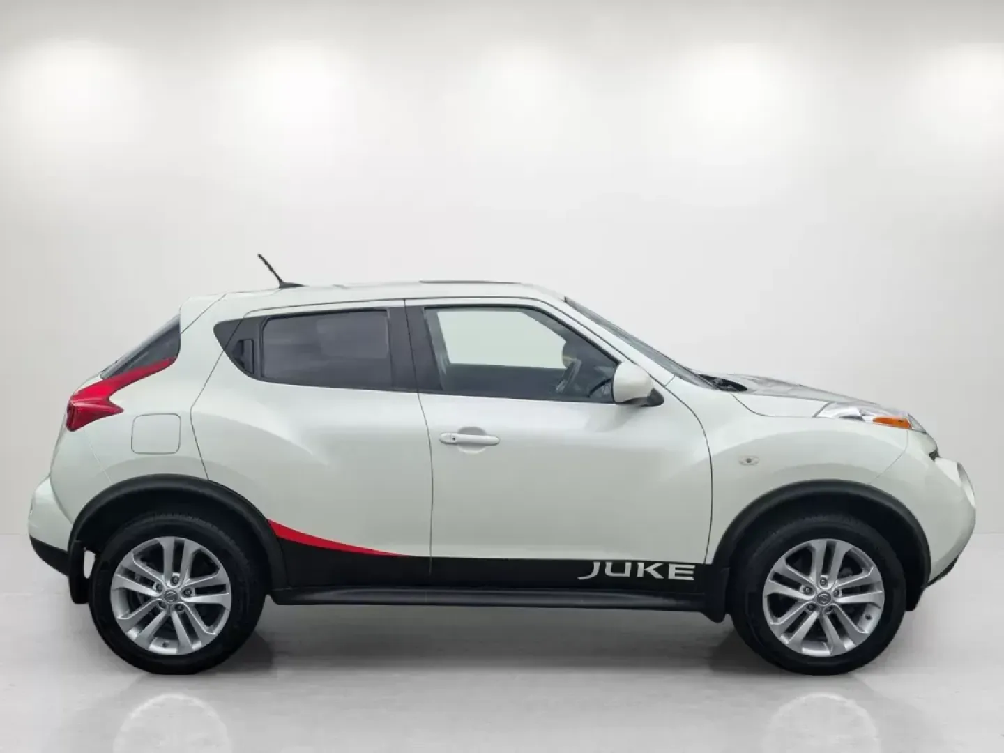 2012 /Black Nissan Juke SV (JN8AF5MRXCT) with an Gas Turbocharged I4 1.6L/ engine, 1-Speed CVT transmission, located at 3959 U.S. 80 W, Phenix City, AL, 36870, (334) 297-4885, 32.469296, -85.135185 - **Discover Your Next Adventure with the 2012 Nissan Juke SV at Gils Auto!** <br /> <br /> If you're looking for a vehicle that perfectly balances style, efficiency, and versatility, the 2012 Nissan Juke SV is an excellent choice for those who love to explore urban landscapes and escape into nature. - Photo#4