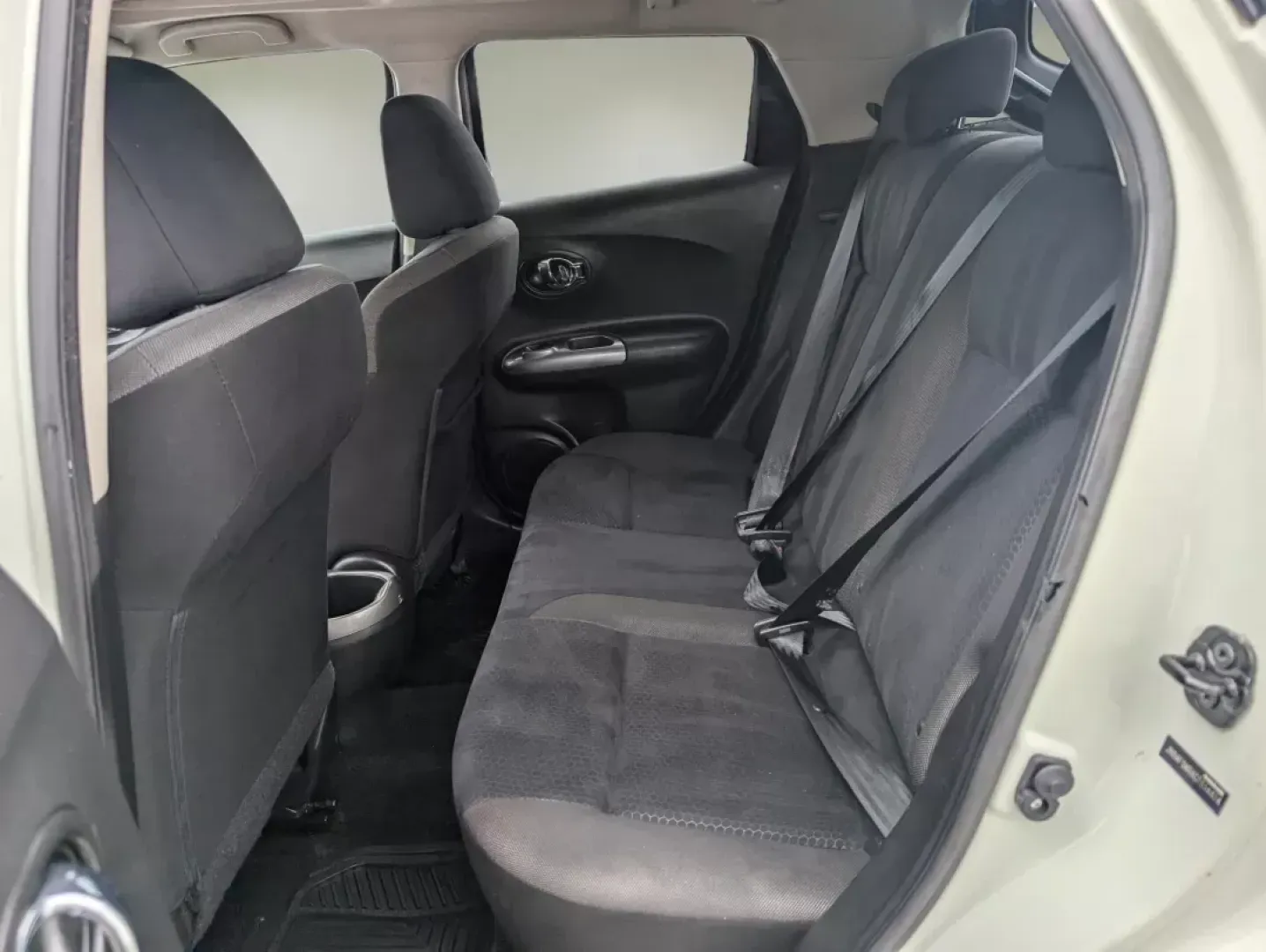 2012 /Black Nissan Juke SV (JN8AF5MRXCT) with an Gas Turbocharged I4 1.6L/ engine, 1-Speed CVT transmission, located at 3959 U.S. 80 W, Phenix City, AL, 36870, (334) 297-4885, 32.469296, -85.135185 - **Discover Your Next Adventure with the 2012 Nissan Juke SV at Gils Auto!** <br /> <br /> If you're looking for a vehicle that perfectly balances style, efficiency, and versatility, the 2012 Nissan Juke SV is an excellent choice for those who love to explore urban landscapes and escape into nature. - Photo#11