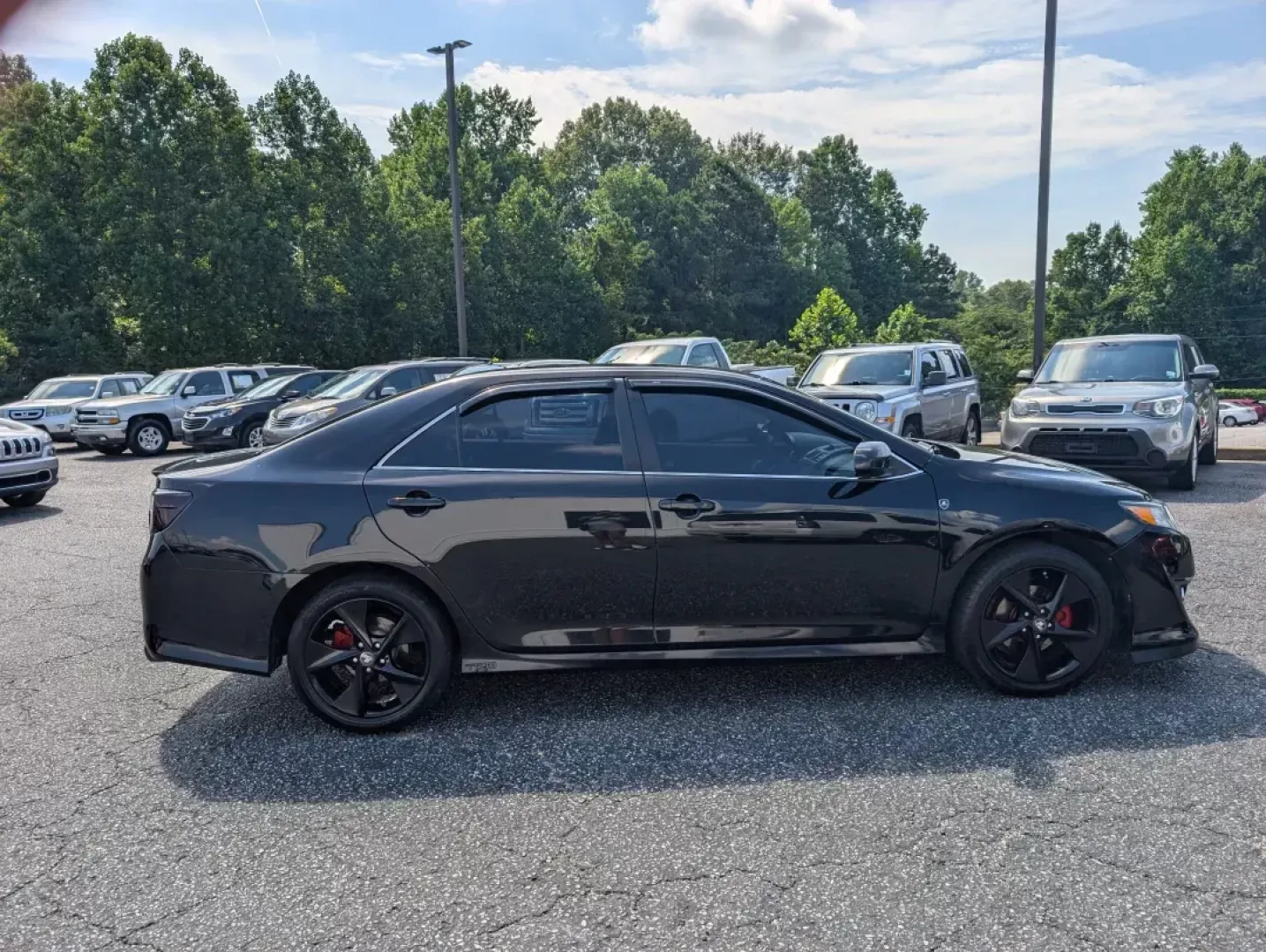 2012 Toyota Camry SE (4T1BF1FK8CU) with an Other engine, located at 1430 Gateway Drive, Opelika, AL, 36801, (334) 239-0944, 32.637871, -85.409790 - Experience the ultimate blend of reliability and comfort with the 2012 Toyota Camry SE, available now at Gils Auto in Opelika, AL. This sedan is perfect for those seeking a dependable daily driver or a family-friendly vehicle that doesn't compromise on style. Whether you're commuting to work, shuttl - Photo#3