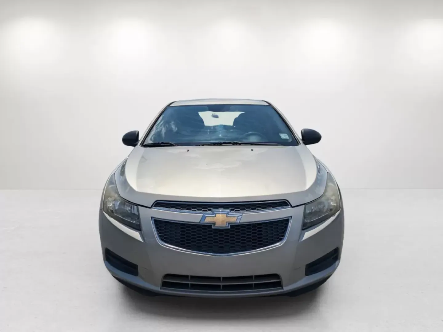 2013 Champagne Silver Metallic /Jet Black/Medium Titanium Chevrolet Cruze LS (1G1PA5SH9D7) with an Gas I4 1.8L/110 engine, 6-Speed Automatic transmission, located at 3959 U.S. 80 W, Phenix City, AL, 36870, (334) 297-4885, 32.469296, -85.135185 - 2013 Chevrolet Cruze LS - Photo#1