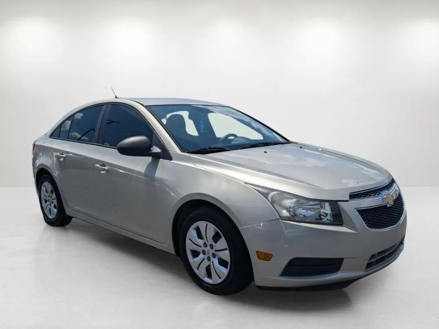 2013 Champagne Silver Metallic /Jet Black/Medium Titanium Chevrolet Cruze LS (1G1PA5SH9D7) with an Gas I4 1.8L/110 engine, 6-Speed Automatic transmission, located at 3959 U.S. 80 W, Phenix City, AL, 36870, (334) 297-4885, 32.469296, -85.135185 - 2013 Chevrolet Cruze LS - Photo#2