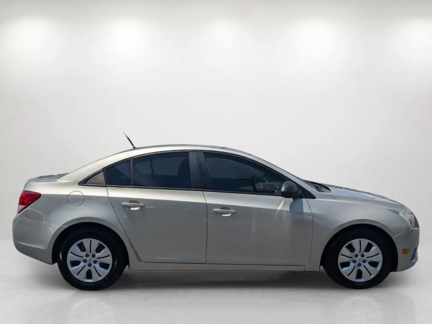 2013 Champagne Silver Metallic /Jet Black/Medium Titanium Chevrolet Cruze LS (1G1PA5SH9D7) with an Gas I4 1.8L/110 engine, 6-Speed Automatic transmission, located at 3959 U.S. 80 W, Phenix City, AL, 36870, (334) 297-4885, 32.469296, -85.135185 - 2013 Chevrolet Cruze LS - Photo#3