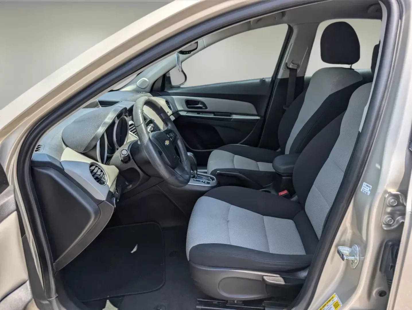 2013 Champagne Silver Metallic /Jet Black/Medium Titanium Chevrolet Cruze LS (1G1PA5SH9D7) with an Gas I4 1.8L/110 engine, 6-Speed Automatic transmission, located at 3959 U.S. 80 W, Phenix City, AL, 36870, (334) 297-4885, 32.469296, -85.135185 - 2013 Chevrolet Cruze LS - Photo#9