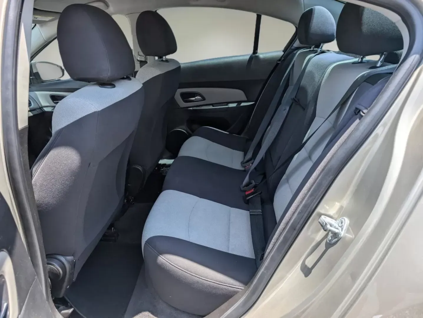 2013 Champagne Silver Metallic /Jet Black/Medium Titanium Chevrolet Cruze LS (1G1PA5SH9D7) with an Gas I4 1.8L/110 engine, 6-Speed Automatic transmission, located at 3959 U.S. 80 W, Phenix City, AL, 36870, (334) 297-4885, 32.469296, -85.135185 - 2013 Chevrolet Cruze LS - Photo#10