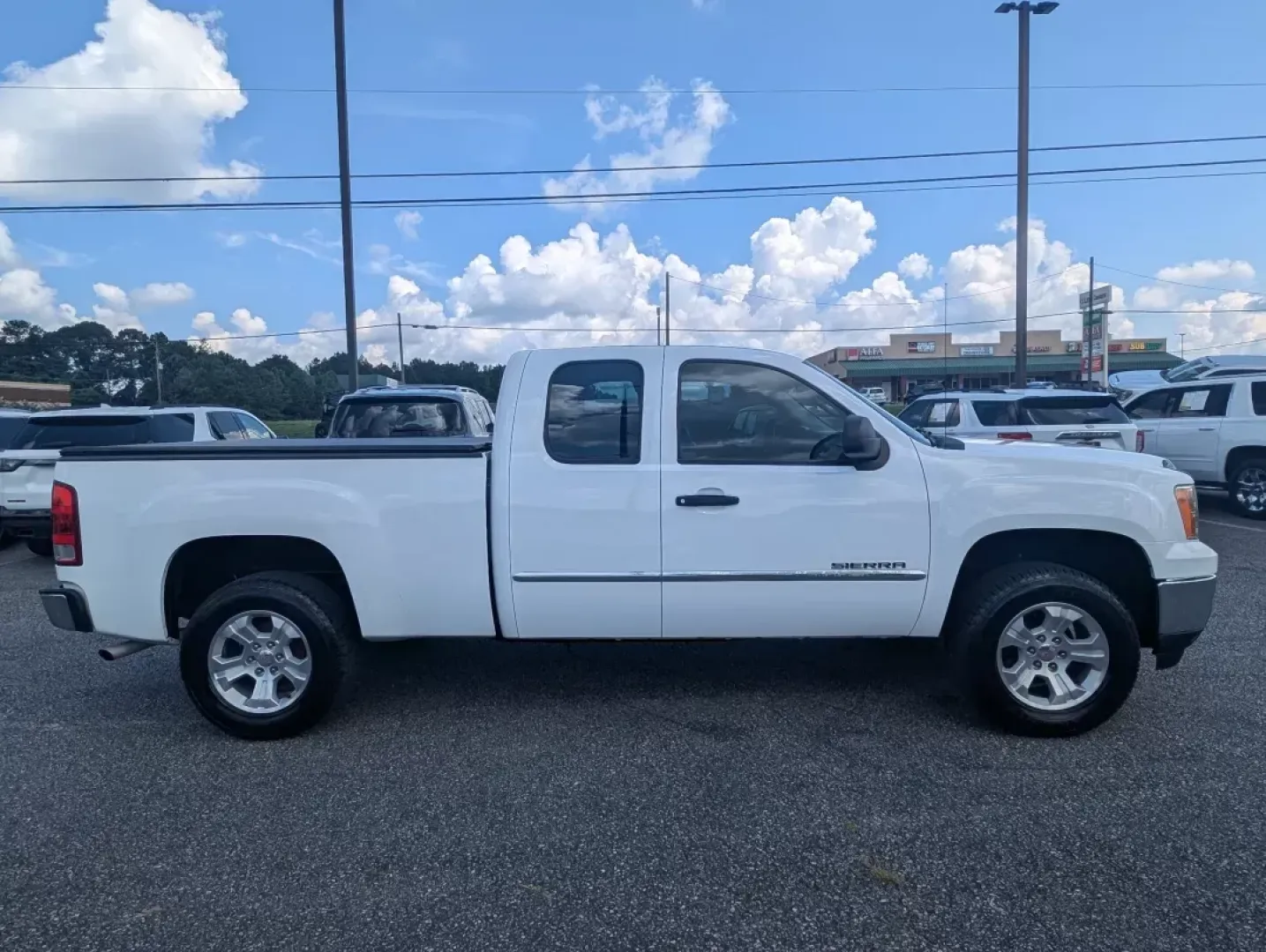 2013 /Dark Titanium GMC Sierra 1500 Work Truck (1GTR1TEX2DZ) with an Other engine, located at 3959 U.S. 80 W, Phenix City, AL, 36870, (334) 297-4885, 32.469296, -85.135185 - **Discover Your Next Adventure with the 2013 GMC Sierra 1500 at Gils Auto in Phenix City, AL!**<br /> <br /> Are you in the market for a vehicle that combines rugged reliability with everyday practicality? Look no further than this dependable 2013 GMC Sierra 1500 Work Truck! Perfect for those who cr - Photo#3