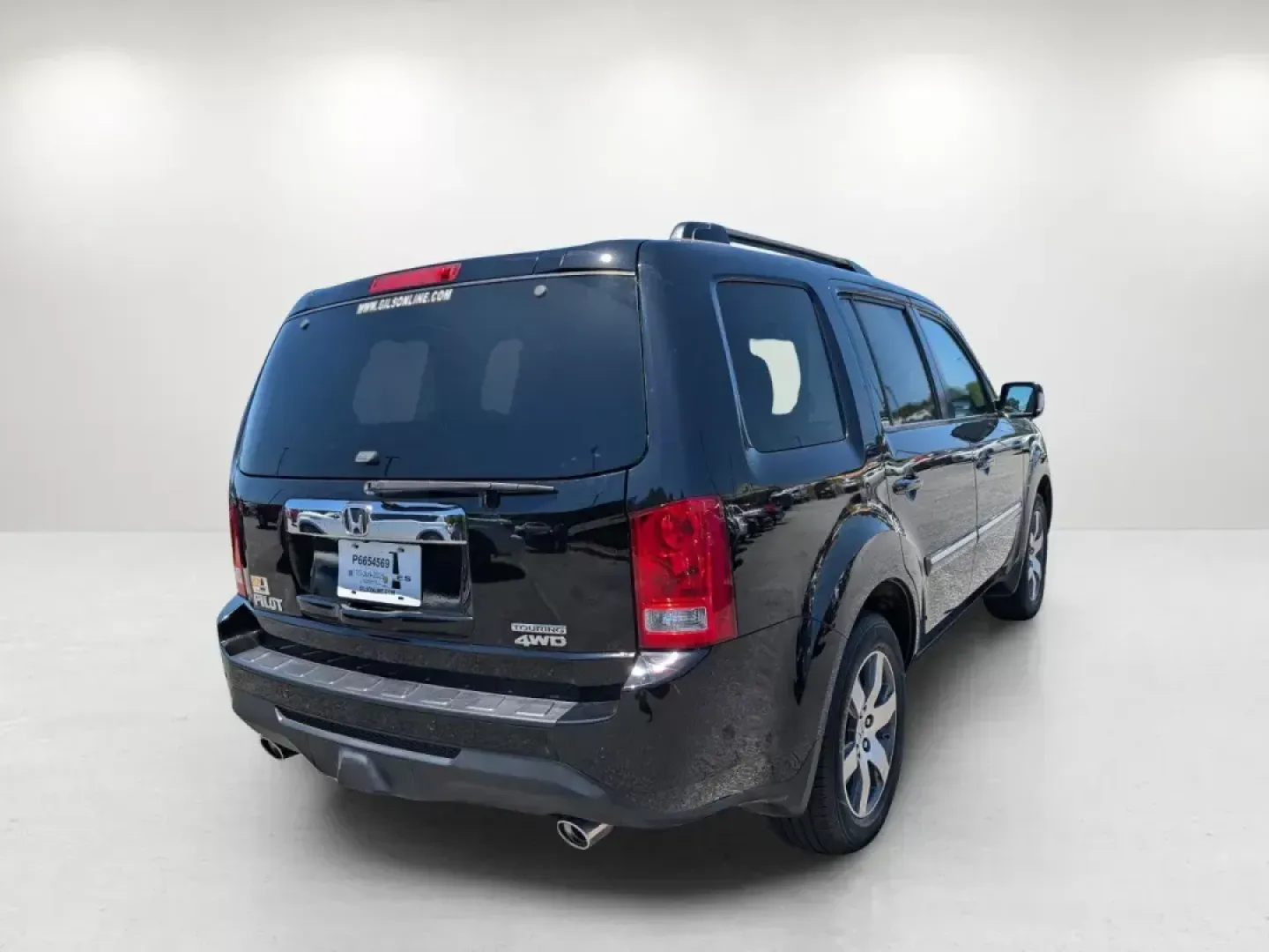 2013 Honda Pilot Touring (5FNYF4H99DB) with an Gas V6 3.5L/212 engine, 5-Speed Automatic transmission, located at 3959 U.S. 80 W, Phenix City, AL, 36870, (334) 297-4885, 32.469296, -85.135185 - 2013 Honda Pilot Touring - Photo#5