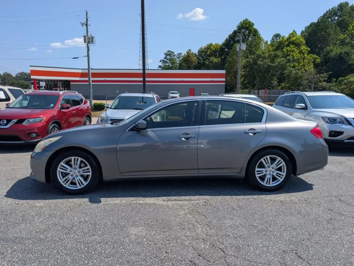 2013 /Graphite Infiniti G37 Sedan Journey (JN1CV6AP2DM) with an Other engine, located at 3959 U.S. 80 W, Phenix City, AL, 36870, (334) 297-4885, 32.469296, -85.135185 - **Elevate Your Daily Drive with the 2013 Infiniti G37 Sedan!**<br /> <br /> Are you ready to transform your daily commute into a luxurious experience? Look no further than this stunning 2013 Infiniti G37 Sedan, now available at Gils Auto in Phenix City, AL! Whether you're navigating the bustling str - Photo#7