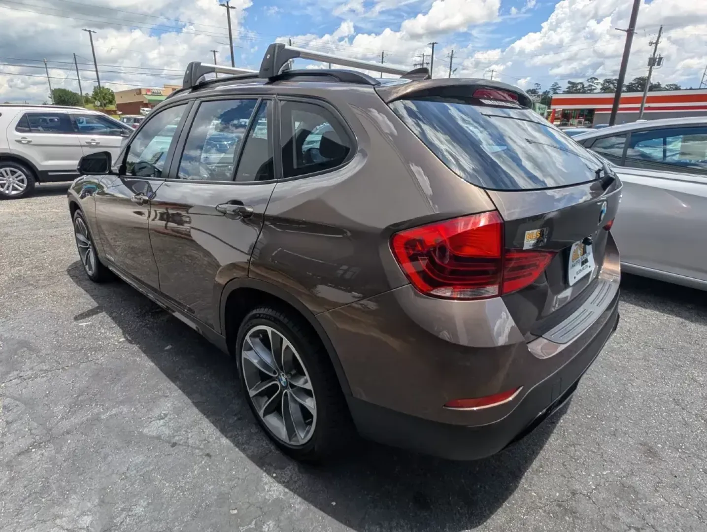 2014 BMW X1 xDrive28i (WBAVL1C56EV) with an Other engine, located at 3959 U.S. 80 W, Phenix City, AL, 36870, (334) 297-4885, 32.469296, -85.135185 - **Discover the Ultimate Blend of Style and Versatility with the 2014 BMW X1 xDrive28i at Gils Auto!**<br /> <br /> Are you in the market for a vehicle that's not just a mode of transport but a lifestyle upgrade? Whether you're navigating the daily hustle as a commuter, embarking on weekend adventure - Photo#7