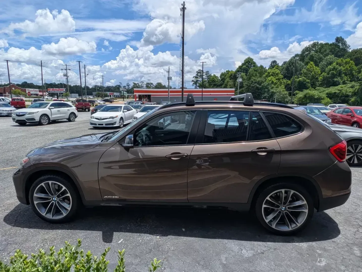 2014 BMW X1 xDrive28i (WBAVL1C56EV) with an Other engine, located at 3959 U.S. 80 W, Phenix City, AL, 36870, (334) 297-4885, 32.469296, -85.135185 - **Discover the Ultimate Blend of Style and Versatility with the 2014 BMW X1 xDrive28i at Gils Auto!**<br /> <br /> Are you in the market for a vehicle that's not just a mode of transport but a lifestyle upgrade? Whether you're navigating the daily hustle as a commuter, embarking on weekend adventure - Photo#8