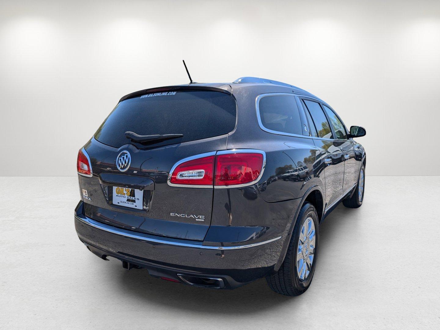 2014 /Titanium Buick Enclave Premium (5GAKVCKD6EJ) with an Gas V6 3.6L/217 engine, 6-Speed Automatic transmission, located at 7000 Northlake Connector, Columbus, GA, 31904, (706) 987-8085, 32.524975, -84.978134 - 2014 Buick Enclave Premium - Photo#5
