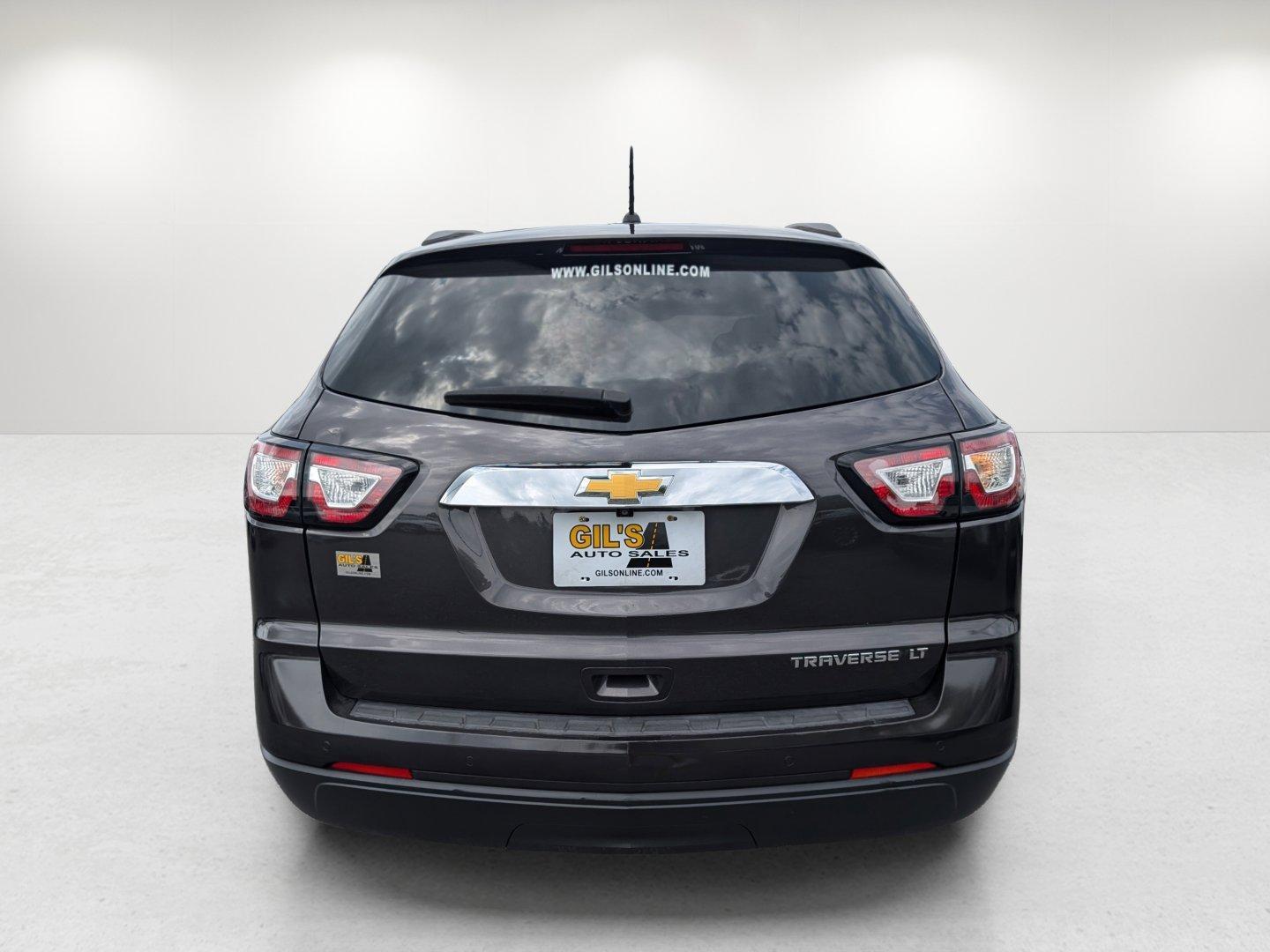 2014 /Ebony Chevrolet Traverse LT (1GNKRGKD4EJ) with an Gas V6 3.6L/217 engine, 6-Speed Automatic transmission, located at 5115 14th Ave., Columbus, GA, 31904, (706) 323-0345, 32.511494, -84.971046 - 2014 Chevrolet Traverse LT - Photo#5