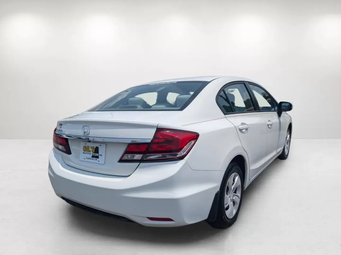 2014 Honda Civic Sedan LX (2HGFB2F52EH) with an Other engine, located at 1430 Gateway Drive, Opelika, AL, 36801, (334) 239-0944, 32.637871, -85.409790 - Are you seeking a reliable vehicle that can effortlessly transition from daily commutes to weekend getaways? Look no further than the 2014 Honda Civic Sedan LX, now available at Gils Auto in Columbus, GA. This sedan isn't just a mode of transportation; it's your ticket to a lifestyle filled with com - Photo#4