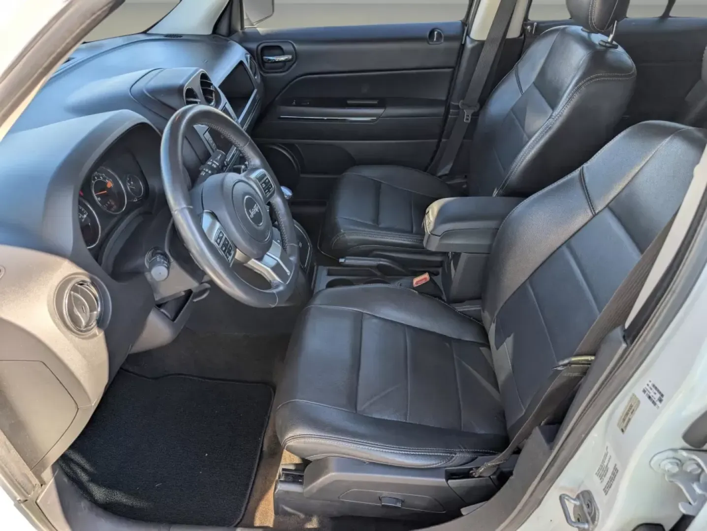 2014 /Dark Slate Gray Jeep Patriot Limited (1C4NJPCB8ED) with an Other engine, located at 1430 Gateway Drive, Opelika, AL, 36801, (334) 239-0944, 32.637871, -85.409790 - Discover the ultimate blend of style and practicality with the 2014 Jeep Patriot Limited, an SUV designed for those who refuse to compromise on adventure or comfort. Whether you're exploring the scenic routes of the Chattahoochee River or commuting through the bustling streets of Phenix City, AL, th - Photo#12