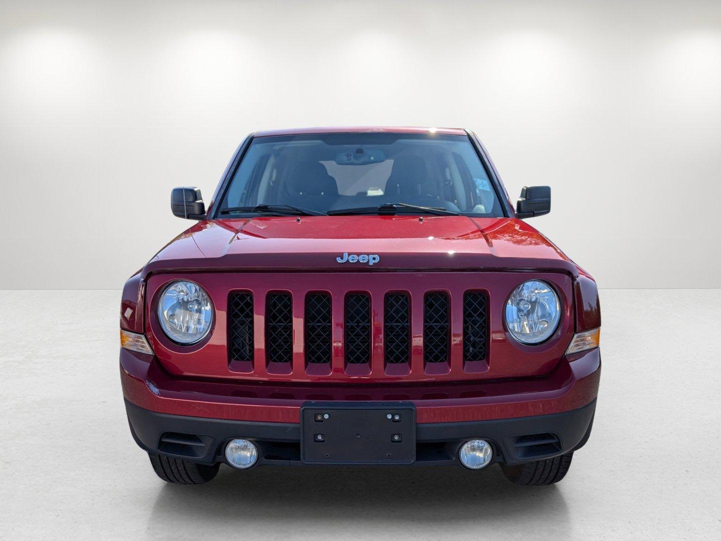 2014 /Dark Slate Gray Jeep Patriot Latitude (1C4NJRFB0ED) with an Regular Unleaded I-4 2.4 L/144 engine, 6-Speed Automatic w/OD transmission, located at 1430 Gateway Drive, Opelika, AL, 36801, (334) 239-0944, 32.637871, -85.409790 - 2014 Jeep Patriot Latitude - Photo#1