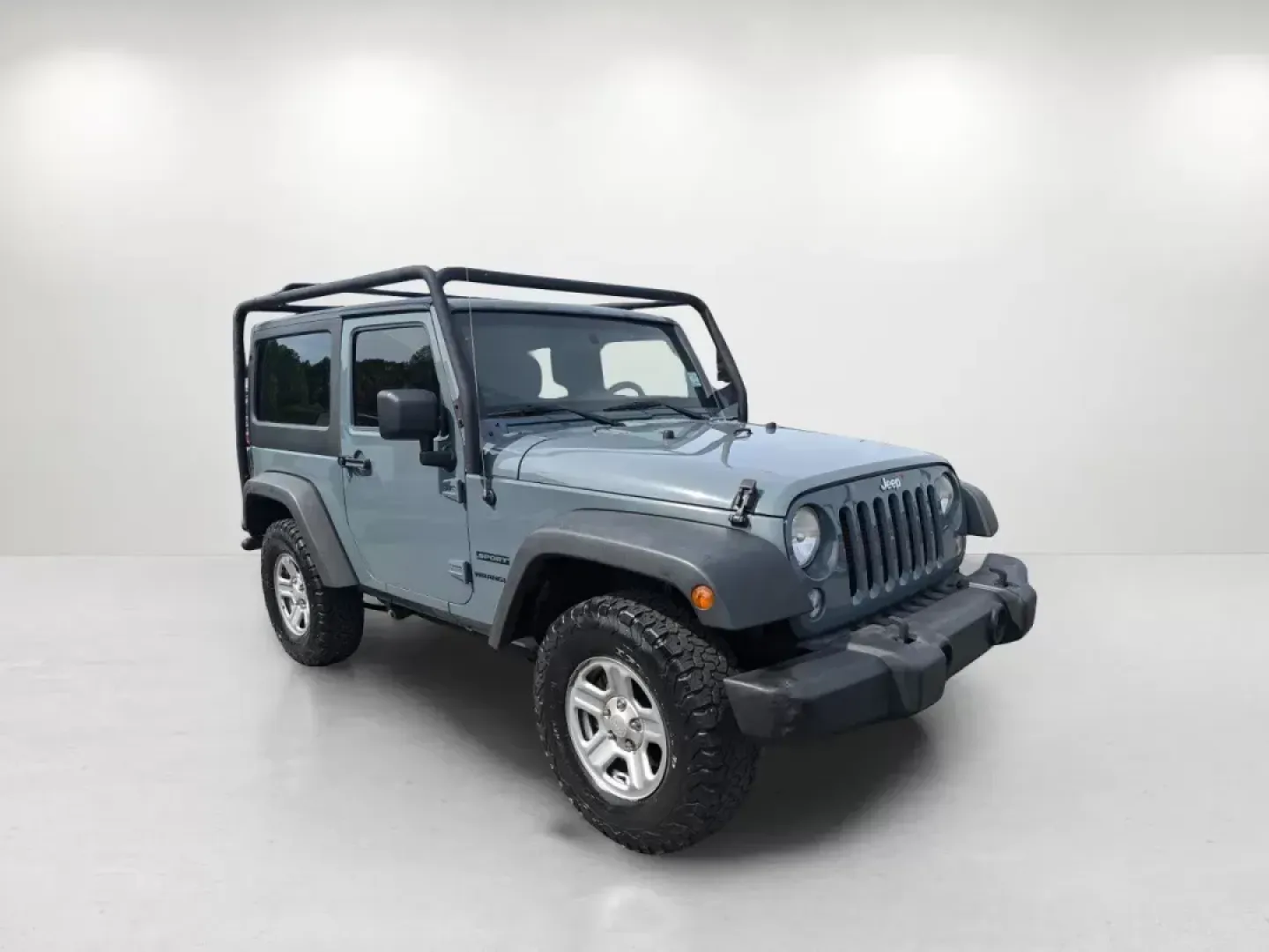 2014 /Black Jeep Wrangler Sport (1C4AJWAG3EL) with an Regular Unleaded V-6 3.6 L/220 engine, 5-Speed Automatic w/OD transmission, located at 5115 14th Ave., Columbus, GA, 31904, (706) 323-0345, 32.511494, -84.971046 - **Unleash Adventure with the 2014 Jeep Wrangler Sport!** <br /> <br /> Are you ready to transform weekends into unforgettable adventures? The 2014 Jeep Wrangler Sport is the ultimate vehicle for those seeking thrilling escapades and the freedom of the open road. Ideal for outdoor enthusiasts, this r - Photo#2