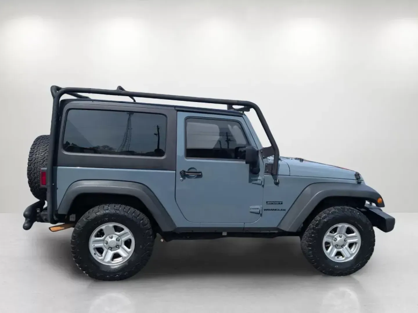 2014 /Black Jeep Wrangler Sport (1C4AJWAG3EL) with an Regular Unleaded V-6 3.6 L/220 engine, 5-Speed Automatic w/OD transmission, located at 5115 14th Ave., Columbus, GA, 31904, (706) 323-0345, 32.511494, -84.971046 - **Unleash Adventure with the 2014 Jeep Wrangler Sport!** <br /> <br /> Are you ready to transform weekends into unforgettable adventures? The 2014 Jeep Wrangler Sport is the ultimate vehicle for those seeking thrilling escapades and the freedom of the open road. Ideal for outdoor enthusiasts, this r - Photo#3