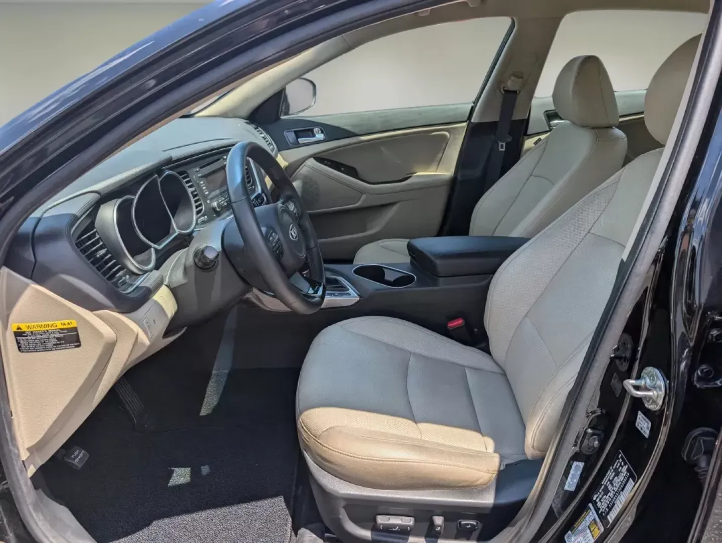 2014 /Beige Kia Optima EX (5XXGN4A73EG) with an Other engine, located at 5115 14th Ave., Columbus, GA, 31904, (706) 323-0345, 32.511494, -84.971046 - Elevate your driving experience with the stunning 2014 Kia Optima EX, now available at Gils Auto - Columbus, located at 5115 14th Ave., Columbus, GA 31904. This exceptional sedan is not only an eye-catcher with its sleek Ebony Black exterior and sophisticated beige leather interior, but it also offe - Photo#9