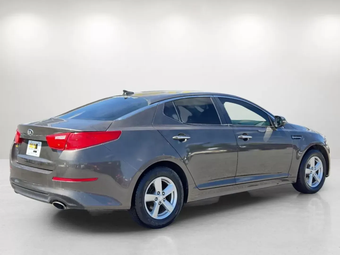 2014 /Beige Kia Optima LX (5XXGM4A74EG) with an Other engine, located at 1430 Gateway Drive, Opelika, AL, 36801, (334) 239-0944, 32.637871, -85.409790 - **Experience Unmatched Comfort and Style with This 2014 Kia Optima LX Perfect for Your Daily Commutes!**<br /> <br /> If you're searching for a dependable sedan that perfectly blends style, comfort, and technology, your quest ends here! The 2014 Kia Optima LX is not just a car; it's a lifestyle upg - Photo#4