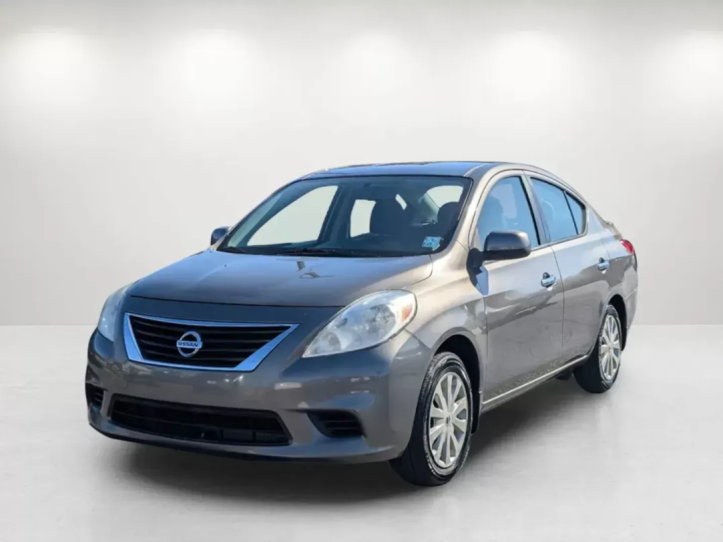 2014 /Charcoal Nissan Versa SV (3N1CN7AP9EL) with an Regular Unleaded I-4 1.6 L/98 engine, 1-Speed CVT w/OD transmission, located at 5115 14th Ave., Columbus, GA, 31904, (706) 323-0345, 32.511494, -84.971046 - 2014 Nissan Versa SV - Photo#0
