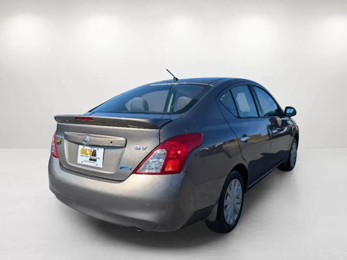 2014 /Charcoal Nissan Versa SV (3N1CN7AP9EL) with an Regular Unleaded I-4 1.6 L/98 engine, 1-Speed CVT w/OD transmission, located at 5115 14th Ave., Columbus, GA, 31904, (706) 323-0345, 32.511494, -84.971046 - 2014 Nissan Versa SV - Photo#4