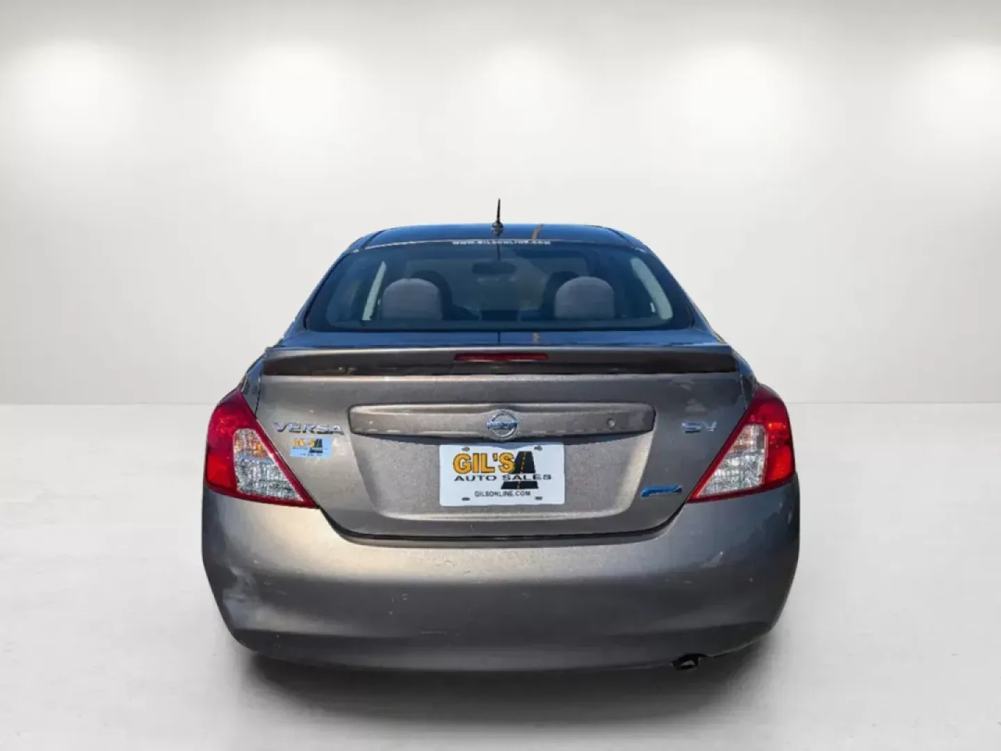 2014 /Charcoal Nissan Versa SV (3N1CN7AP9EL) with an Regular Unleaded I-4 1.6 L/98 engine, 1-Speed CVT w/OD transmission, located at 5115 14th Ave., Columbus, GA, 31904, (706) 323-0345, 32.511494, -84.971046 - 2014 Nissan Versa SV - Photo#5