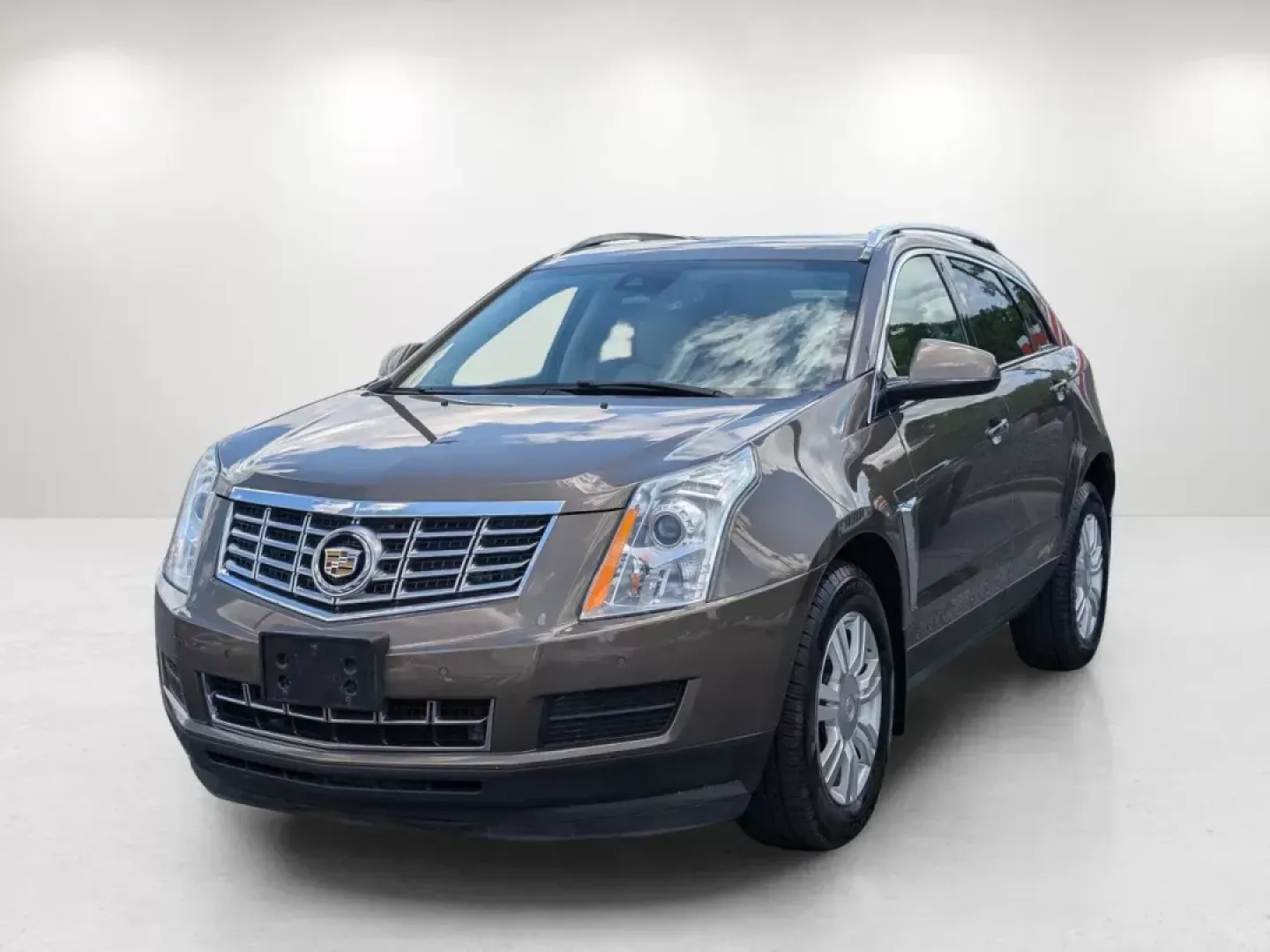 2015 /Shale w/Brownstone accents Cadillac SRX Luxury Collection (3GYFNBE33FS) with an Gas V6 3.6L/217 engine, 6-Speed Automatic w/Manual Shift transmission, located at 7000 Northlake Connector, Columbus, GA, 31904, (706) 987-8085, 32.524975, -84.978134 - 2015 Cadillac SRX Luxury Collection - Photo#0