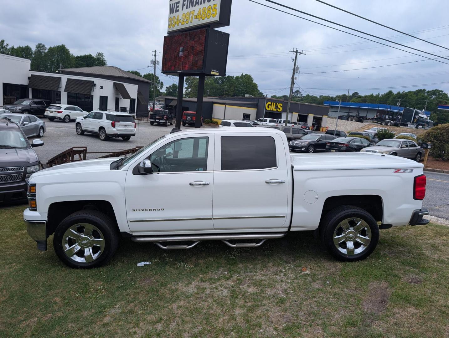 2015 /Cocoa/Dune Chevrolet Silverado 1500 LTZ (3GCUKSEC3FG) with an Gas V8 5.3L/325 engine, 6-Speed Automatic transmission, located at 1430 Gateway Drive, Opelika, AL, 36801, (334) 239-0944, 32.637871, -85.409790 - 2015 Chevrolet Silverado 1500 LTZ - Photo#7