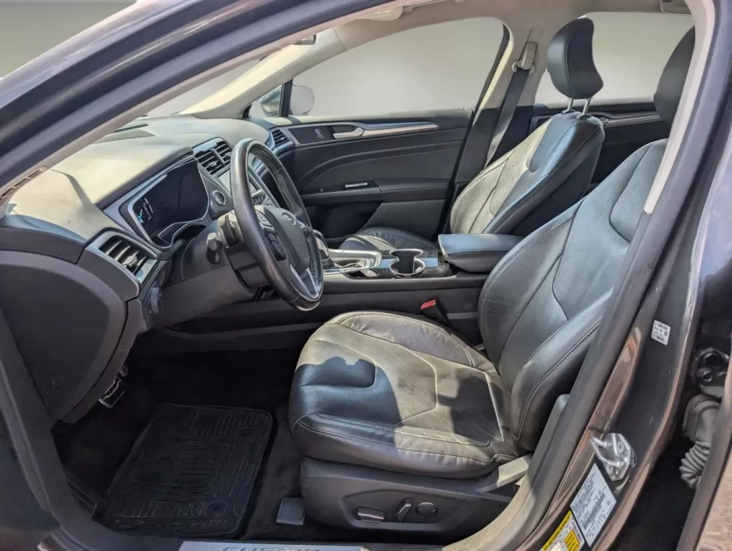 2015 Ford Fusion Titanium (3FA6P0D91FR) with an Other engine, located at 804 22nd Ave, Phenix City, AL, 36870, (334) 297-1860, 32.484749, -85.024475 - Are you ready to elevate your daily commute and weekend adventures? Look no further! At Gils Auto in Phenix City, AL, we're excited to present a fantastic opportunity to own a 2015 Ford Fusion Titanium. This stylish sedan is perfect for those who seek a reliable vehicle that seamlessly fits into an - Photo#9