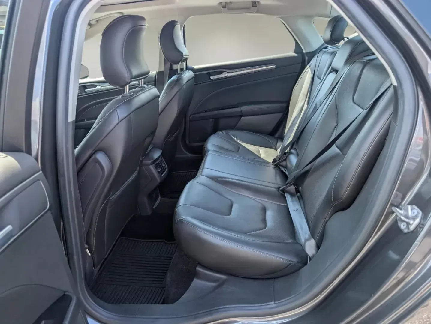 2015 Ford Fusion Titanium (3FA6P0D91FR) with an Other engine, located at 804 22nd Ave, Phenix City, AL, 36870, (334) 297-1860, 32.484749, -85.024475 - Are you ready to elevate your daily commute and weekend adventures? Look no further! At Gils Auto in Phenix City, AL, we're excited to present a fantastic opportunity to own a 2015 Ford Fusion Titanium. This stylish sedan is perfect for those who seek a reliable vehicle that seamlessly fits into an - Photo#10