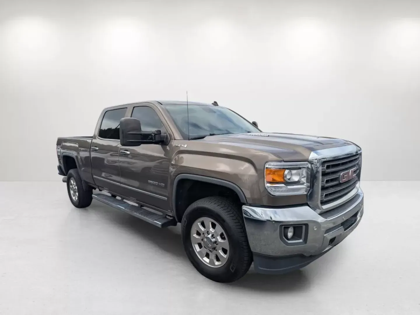 2015 /Cocoa/Dune GMC Sierra 2500HD SLT (1GT12ZE89FF) with an Other engine, located at 3959 U.S. 80 W, Phenix City, AL, 36870, (334) 297-4885, 32.469296, -85.135185 - **Unleash Adventure with the 2015 GMC Sierra 2500HD SLT at Gils Auto - Your Trusted Buy Here Pay Here Dealer in Phenix City, AL!**<br /> <br /> Are you ready to elevate your weekend adventures or tackle your daily commute with confidence? Look no further than the robust and stylish 2015 GMC Sierra 2 - Photo#2