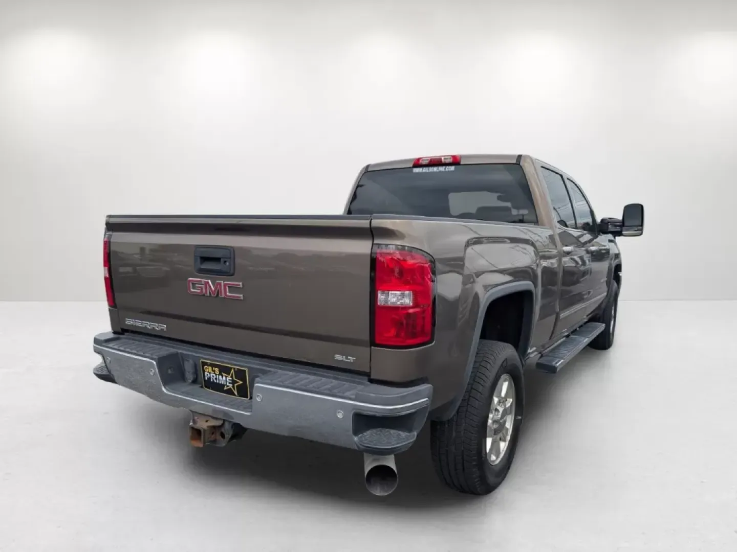 2015 /Cocoa/Dune GMC Sierra 2500HD SLT (1GT12ZE89FF) with an Other engine, located at 3959 U.S. 80 W, Phenix City, AL, 36870, (334) 297-4885, 32.469296, -85.135185 - **Unleash Adventure with the 2015 GMC Sierra 2500HD SLT at Gils Auto - Your Trusted Buy Here Pay Here Dealer in Phenix City, AL!**<br /> <br /> Are you ready to elevate your weekend adventures or tackle your daily commute with confidence? Look no further than the robust and stylish 2015 GMC Sierra 2 - Photo#4