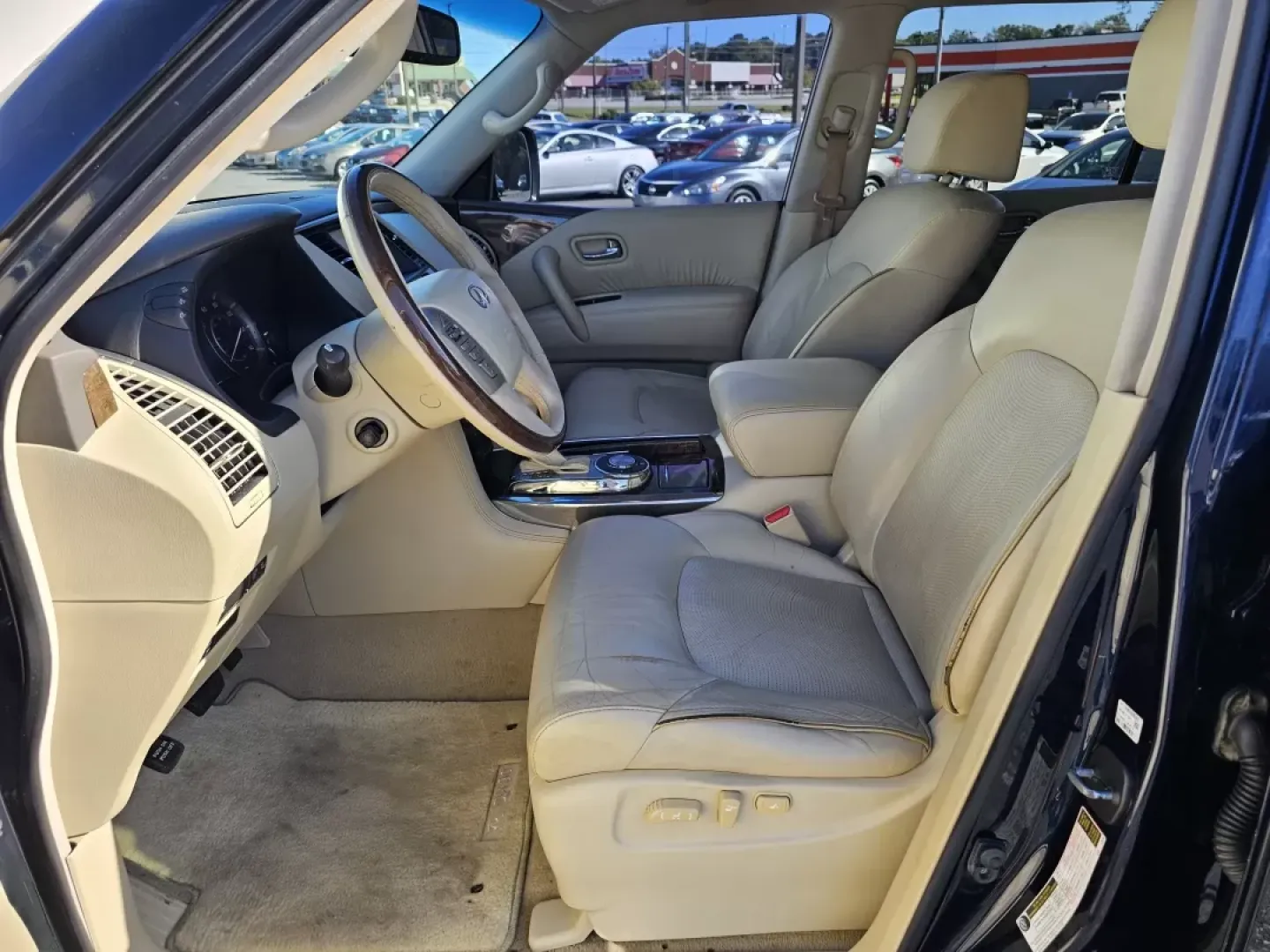2015 /Wheat Infiniti QX80 (JN8AZ2NF6F9) with an Other engine, located at 3959 U.S. 80 W, Phenix City, AL, 36870, (334) 297-4885, 32.469296, -85.135185 - ### Experience Luxury and Adventure with the 2015 Infiniti QX80 at Gils Auto<br /> <br /> Are you searching for a vehicle that combines luxury with functionality, perfect for weekend getaways or daily commutes? Look no further than the stunning 2015 Infiniti QX80 available at Gils Auto in Phenix Cit - Photo#9