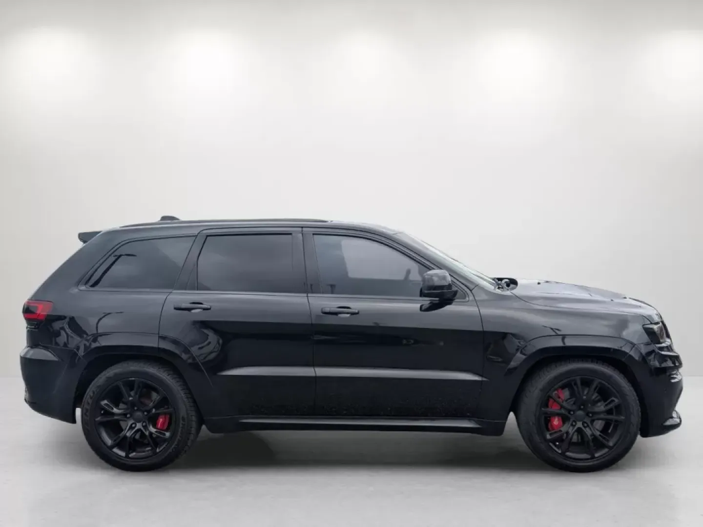 2015 /Black Jeep Grand Cherokee SRT (1C4RJFDJXFC) with an Other engine, located at 1430 Gateway Drive, Opelika, AL, 36801, (334) 239-0944, 32.637871, -85.409790 - **Elevate Your Adventures with the 2015 Jeep Grand Cherokee SRT at Gils Auto!**<br /> <br /> Are you ready to take your outdoor adventures to the next level? Whether it's cruising along the Chattahoochee River, tackling rugged terrains at nearby hiking trails, or simply enjoying a comfortable ride t - Photo#3