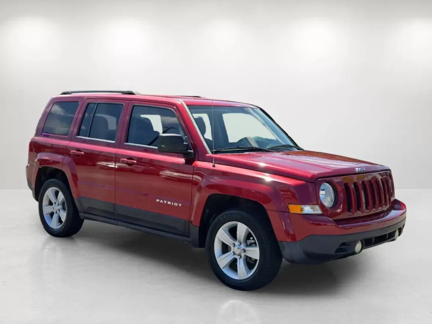 2015 /Dark Slate Gray Jeep Patriot Latitude (1C4NJPFBXFD) with an Other engine, located at 804 22nd Ave, Phenix City, AL, 36870, (334) 297-1860, 32.484749, -85.024475 - 2015 Jeep Patriot Latitude - Photo#2