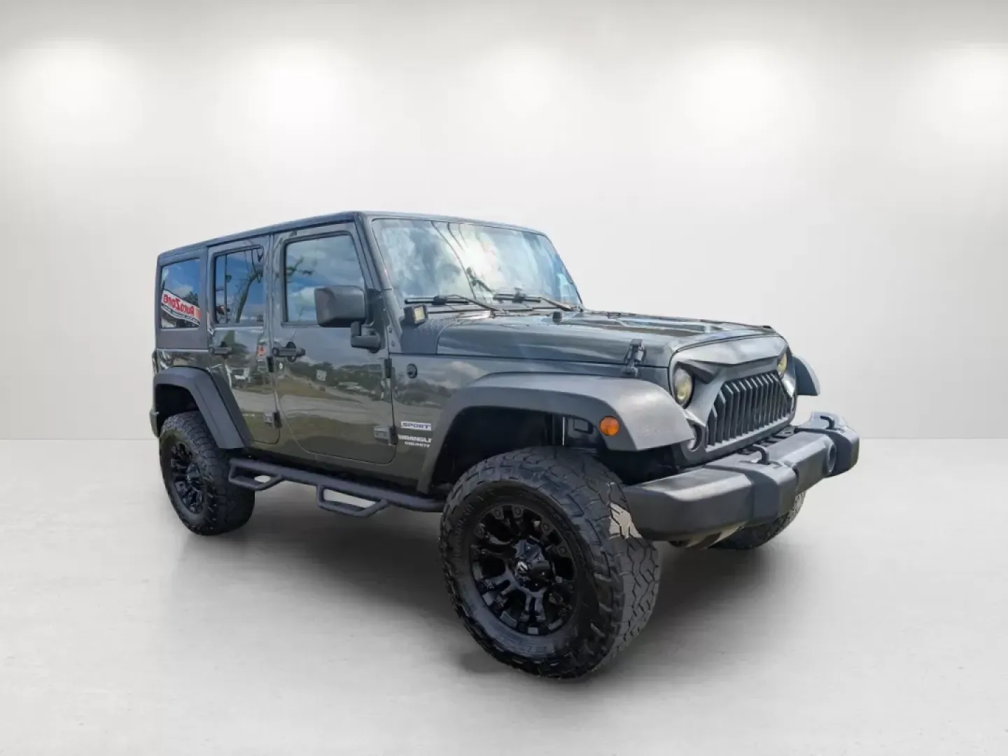 2015 /Black Jeep Wrangler Sport (1C4BJWDG4FL) with an Other engine, located at 5115 14th Ave., Columbus, GA, 31904, (706) 323-0345, 32.511494, -84.971046 - **Adventure Awaits with the 2015 Jeep Wrangler at Gils Auto - Phenix City!**<br /> <br /> Are you ready to take on the great outdoors, cruise through city streets, or embark on a family road trip? The 2015 Jeep Wrangler Sport is your ultimate companion for adventure, designed to handle any terrain w - Photo#3