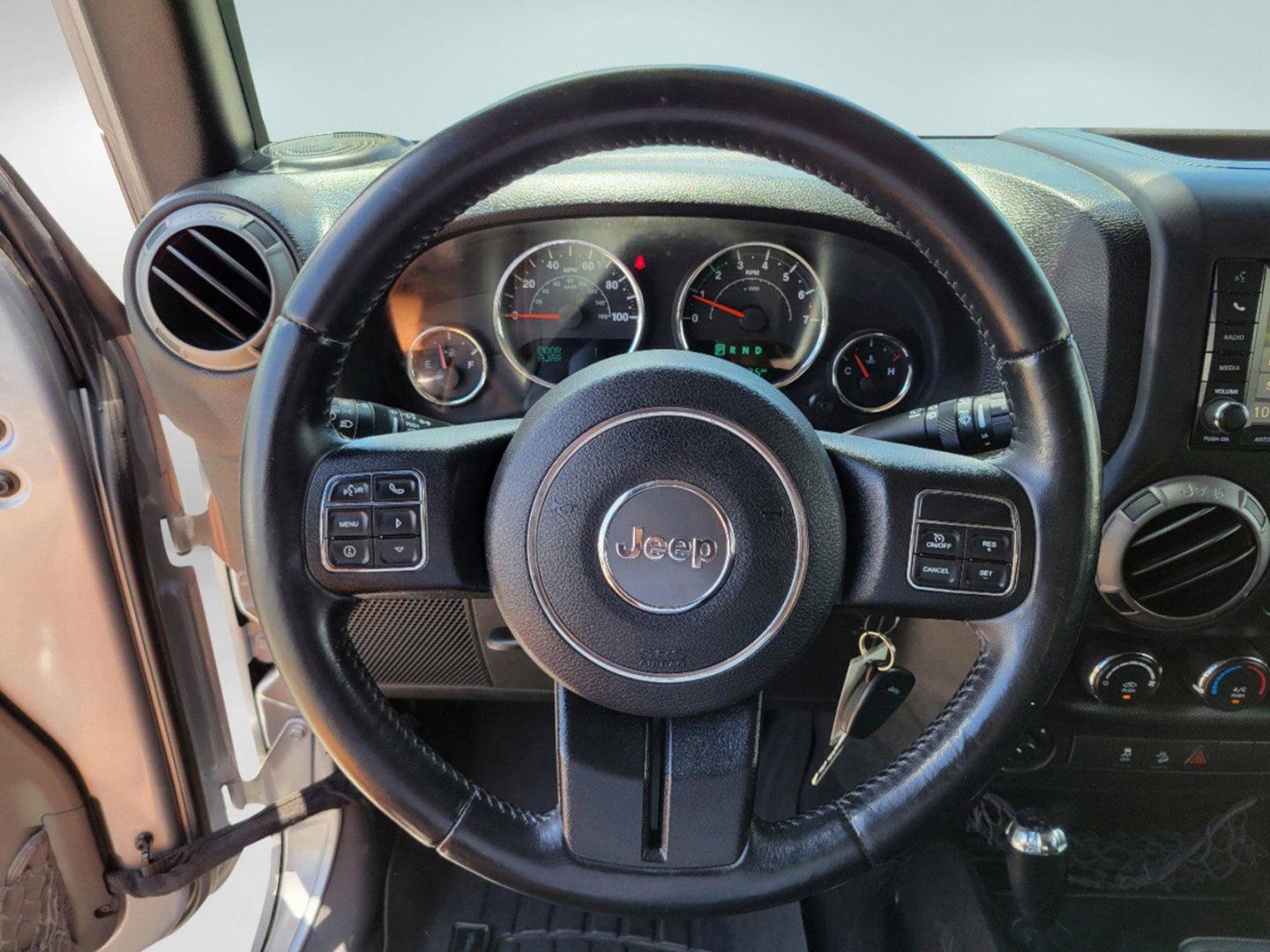 2015 Billet Silver Metallic Clearcoat /Black Jeep Wrangler Unlimited Sport (1C4HJWDG2FL) with an Regular Unleaded V-6 3.6 L/220 engine, 5-Speed Automatic w/OD transmission, located at 7000 Northlake Connector, Columbus, GA, 31904, (706) 987-8085, 32.524975, -84.978134 - 2015 Jeep Wrangler Unlimited Sport - Photo#13