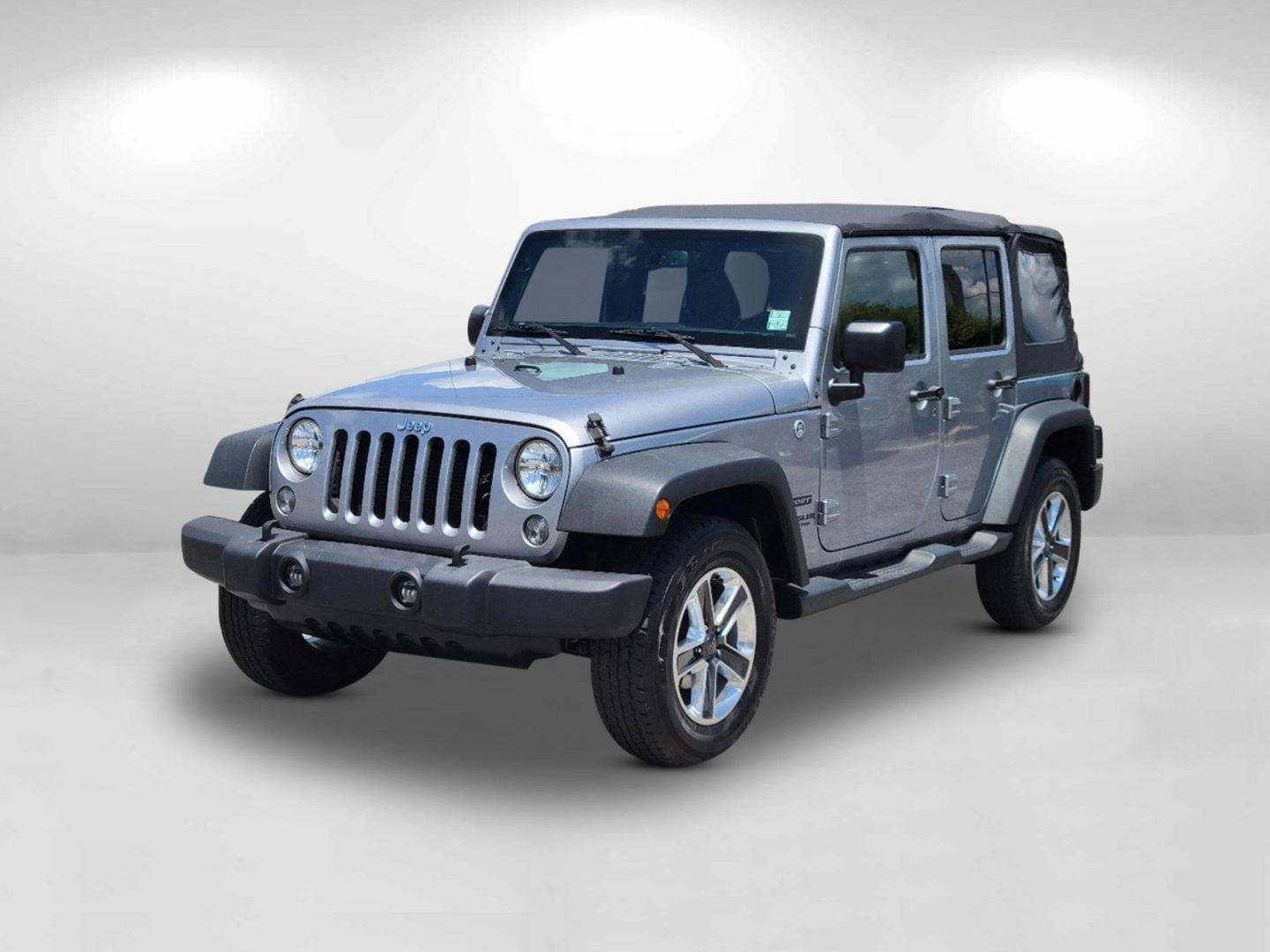 2015 Billet Silver Metallic Clearcoat /Black Jeep Wrangler Unlimited Sport (1C4HJWDG2FL) with an Regular Unleaded V-6 3.6 L/220 engine, 5-Speed Automatic w/OD transmission, located at 7000 Northlake Connector, Columbus, GA, 31904, (706) 987-8085, 32.524975, -84.978134 - 2015 Jeep Wrangler Unlimited Sport - Photo#1