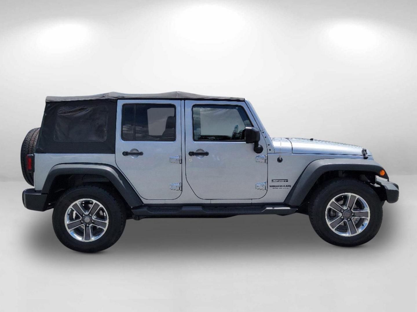 2015 Billet Silver Metallic Clearcoat /Black Jeep Wrangler Unlimited Sport (1C4HJWDG2FL) with an Regular Unleaded V-6 3.6 L/220 engine, 5-Speed Automatic w/OD transmission, located at 7000 Northlake Connector, Columbus, GA, 31904, (706) 987-8085, 32.524975, -84.978134 - 2015 Jeep Wrangler Unlimited Sport - Photo#5