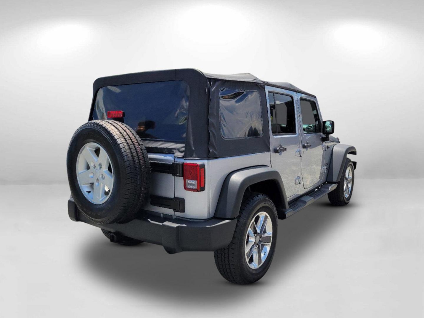 2015 Billet Silver Metallic Clearcoat /Black Jeep Wrangler Unlimited Sport (1C4HJWDG2FL) with an Regular Unleaded V-6 3.6 L/220 engine, 5-Speed Automatic w/OD transmission, located at 7000 Northlake Connector, Columbus, GA, 31904, (706) 987-8085, 32.524975, -84.978134 - 2015 Jeep Wrangler Unlimited Sport - Photo#6