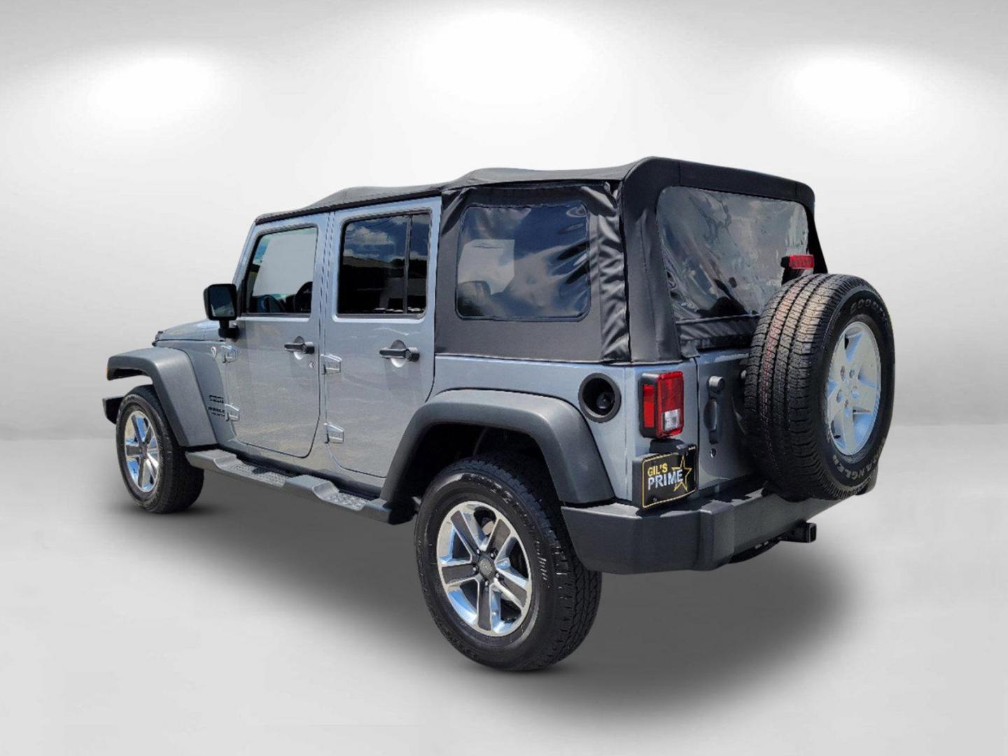 2015 Billet Silver Metallic Clearcoat /Black Jeep Wrangler Unlimited Sport (1C4HJWDG2FL) with an Regular Unleaded V-6 3.6 L/220 engine, 5-Speed Automatic w/OD transmission, located at 7000 Northlake Connector, Columbus, GA, 31904, (706) 987-8085, 32.524975, -84.978134 - 2015 Jeep Wrangler Unlimited Sport - Photo#8