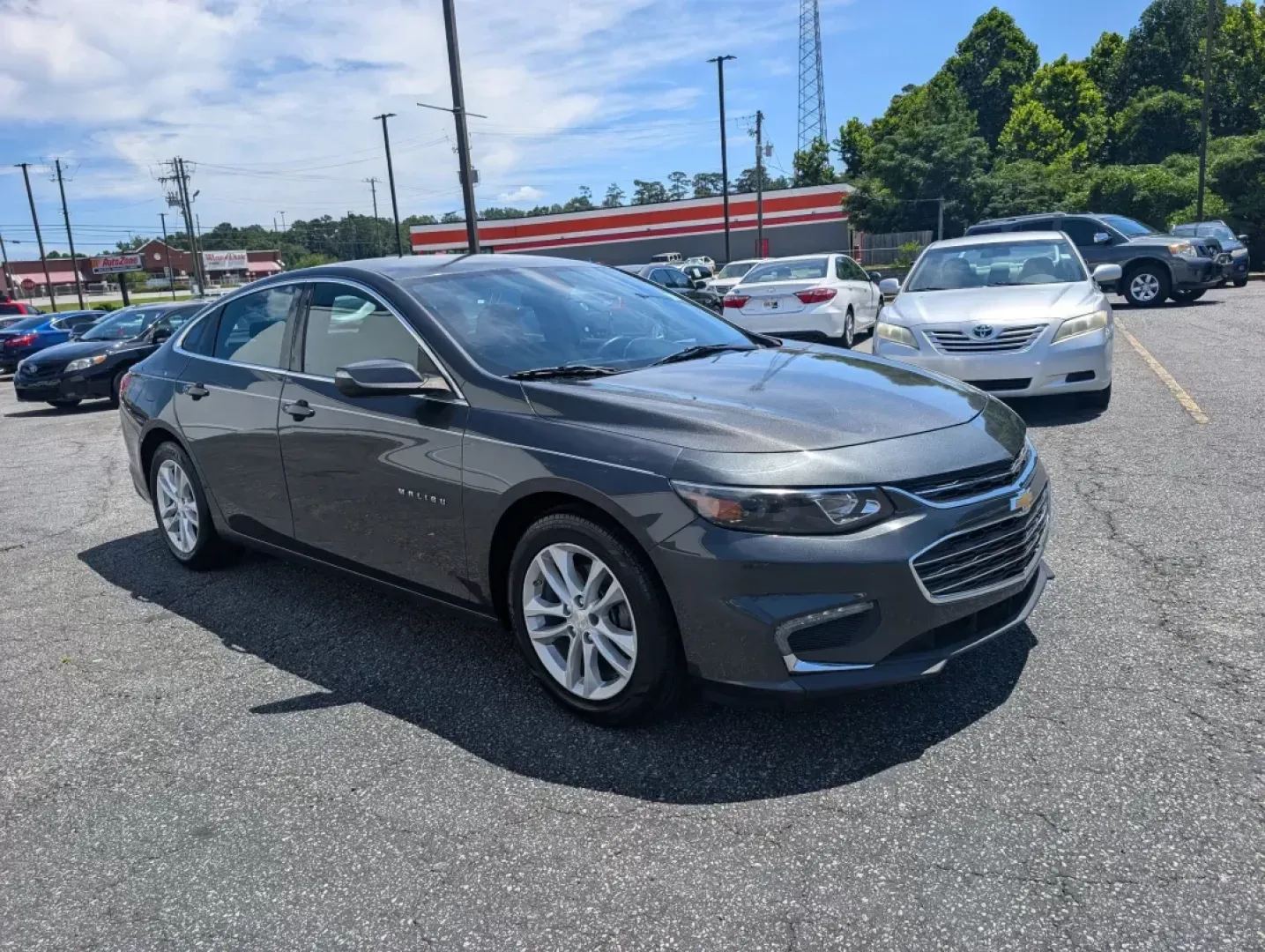 2016 /Jet Black Chevrolet Malibu LT (1G1ZE5ST7GF) with an Other engine, located at 5115 14th Ave., Columbus, GA, 31904, (706) 323-0345, 32.511494, -84.971046 - **Drive Toward Your Next Adventure with the 2016 Chevrolet Malibu LT at Gils Auto - Columbus!**<br /> <br /> Are you searching for the perfect blend of style, comfort, and performance for your daily commute or family outings? Look no further than this stunning 2016 Chevrolet Malibu LT, available now - Photo#2